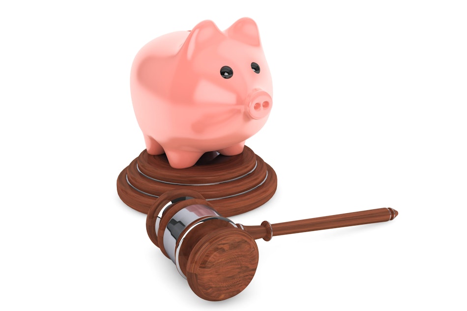 Judicial gavel and piggy bank